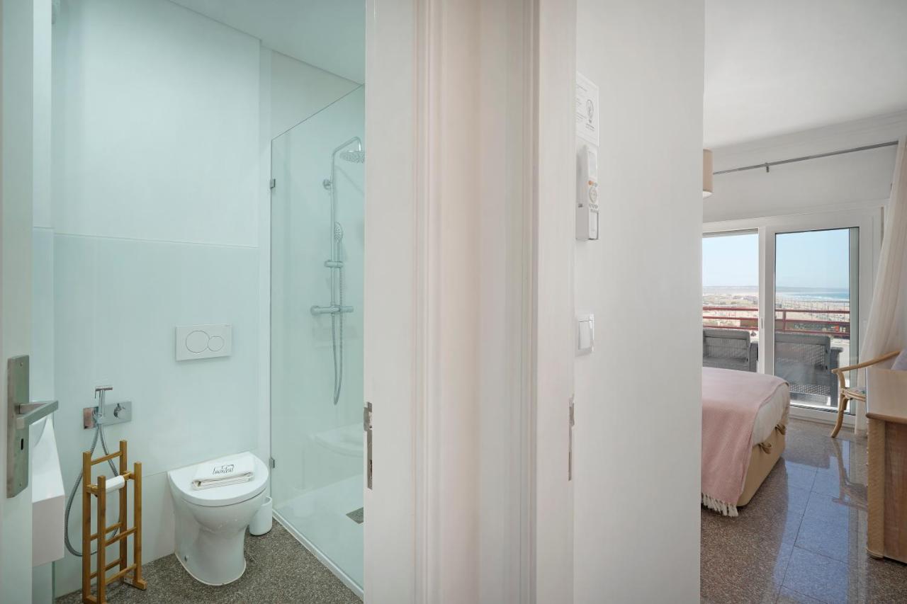 Costa Beach Apartment By The Portuguese Butler Costa de Caparica Exteriör bild