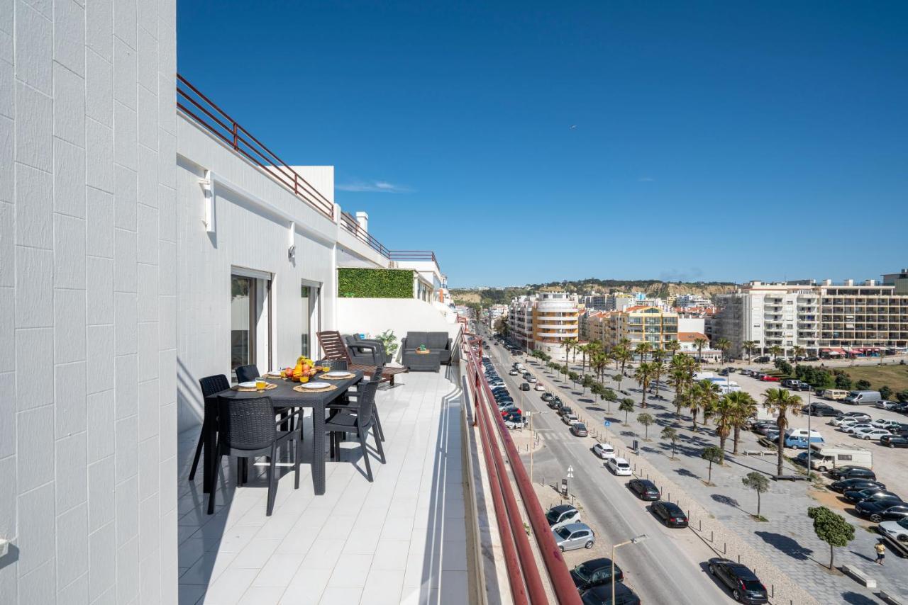Costa Beach Apartment By The Portuguese Butler Costa de Caparica Exteriör bild